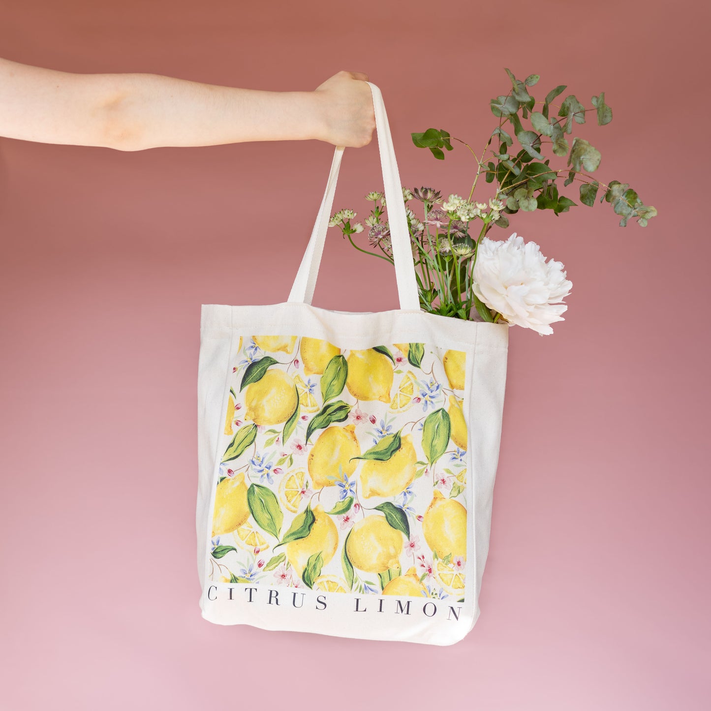 tote bag holding farmers market flowers