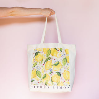 lemon print tote bag. Gusset side and bottom bag with an a5 inner pocket. Lemon and floral print originally hand painted by ellie mae.