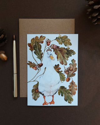 Blank inside card. Outside features whimsical duck surrounded by acorns and leaves.