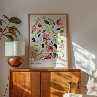boho flora chintz art print styled on wooden unit with mid century lamp and plant 