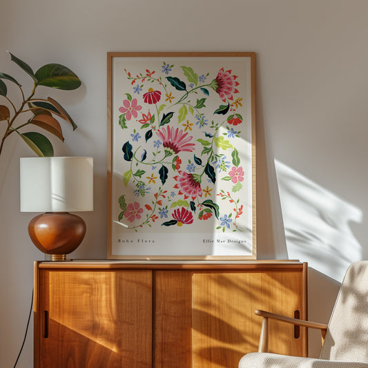 boho flora chintz art print styled on wooden unit with mid century lamp and plant 