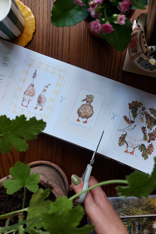 Cutting out the x3 prints within the calendar
