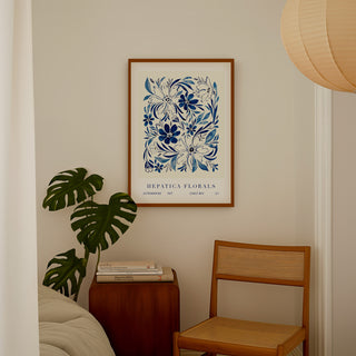 hepatica florals styled by chair and plants 