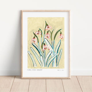 Snowdrop art print, a light muted yellow painted background with pinky snowdrop flowers and olive green/ turquoise leaves. With small text reading floral studies: snowdrop no.2