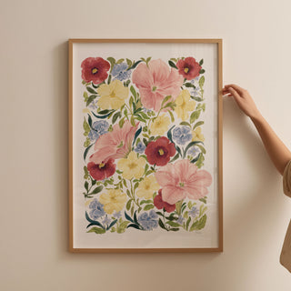 petunia blooms art print styled in thin oak frame against blank wall