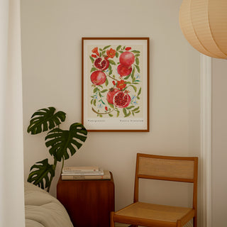 bold pomegranate print styled against mid century furniture