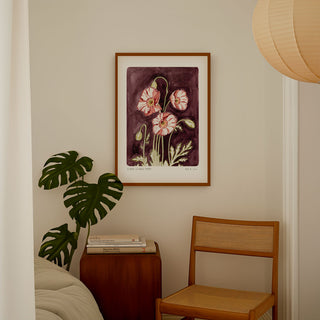 Plum coloured painted background with pink poppy flowers and text reading  floral studies: Poppy No.8 framed for styling in bedroom