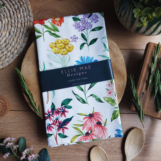 floral tea towel with dark navy belly band great for gifting