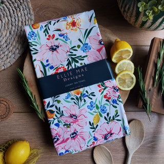 floral and citrus fruit tea towel with branded belly band ideal for gifting 