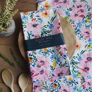 painterly blooms, pink and citrus fruit patterned cotton tea towel for kitchen