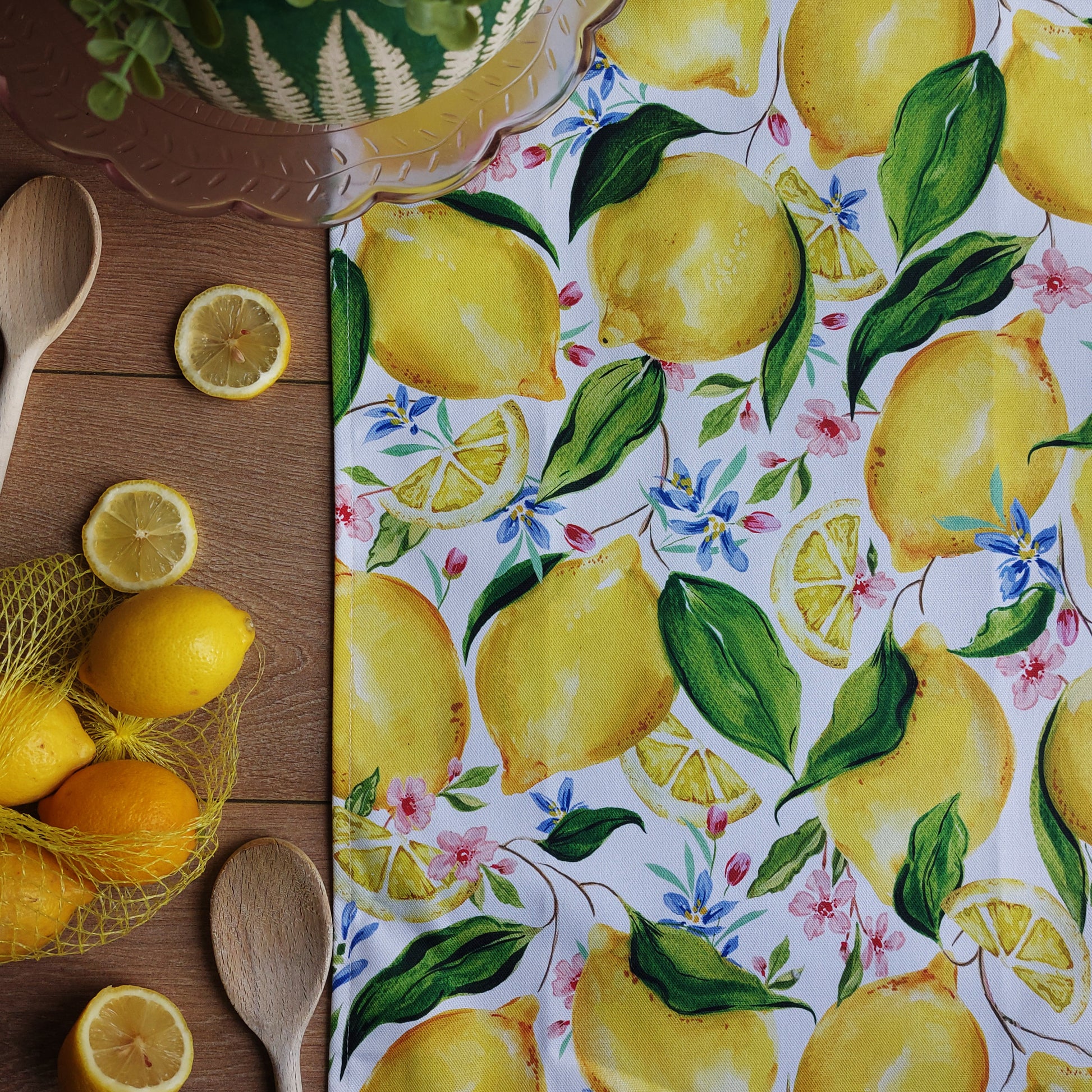 lemon pattern tea towel perfect for gifting to the person you know who loves baking, cooking and decorating their kitchen
