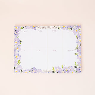 lilac blooms a4 weekly desk planner with 50 tear off pages.