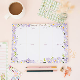 lilac blooms a4 weekly desk planner with 50 tear off pages.