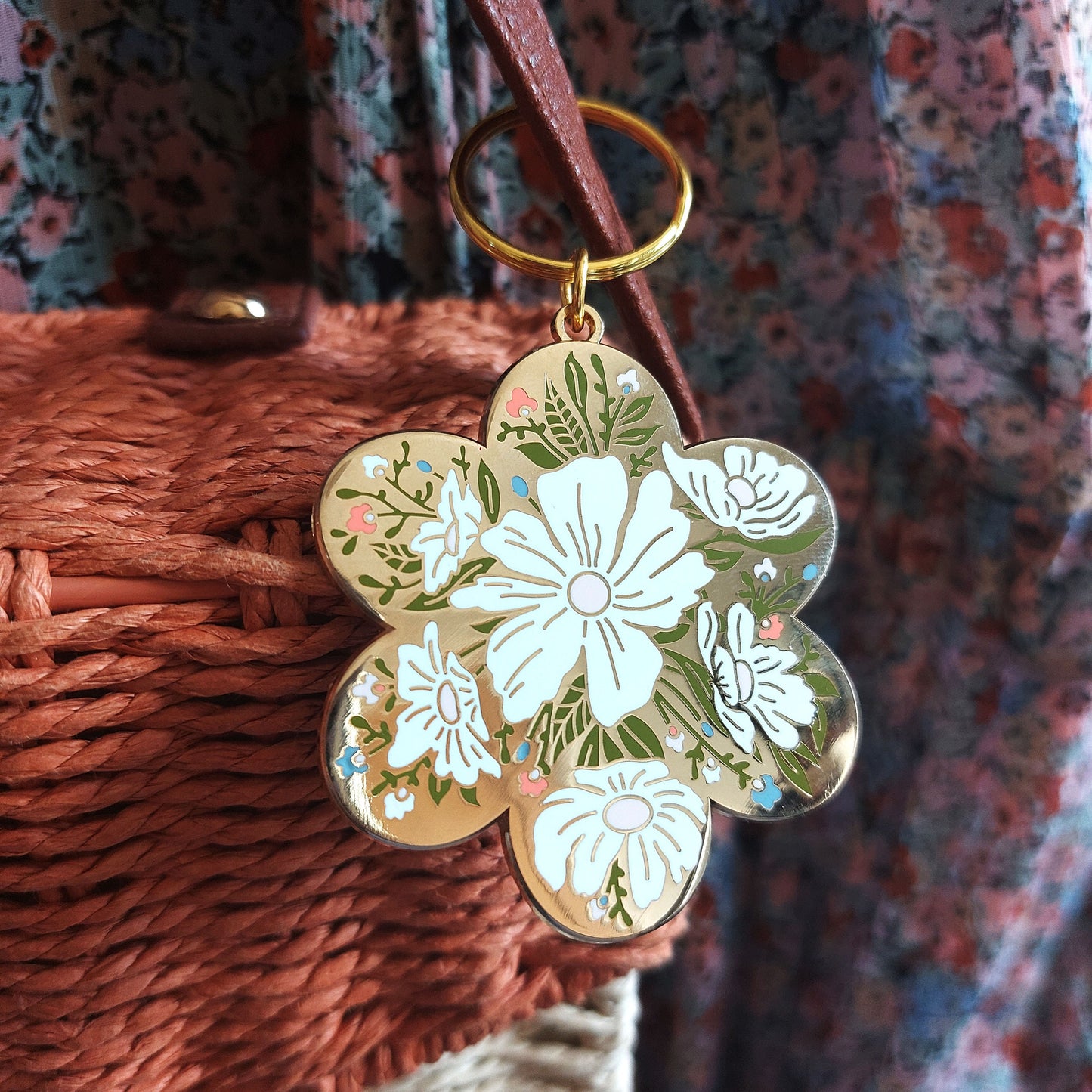 floral keyring accessory on bag 