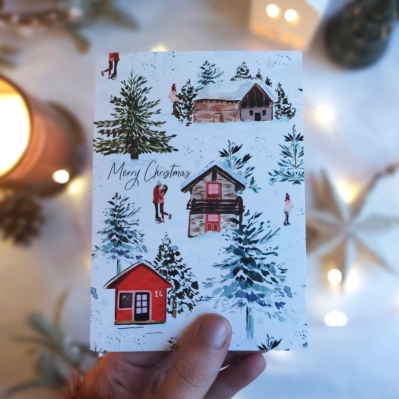 ski chalet, ski couple a6 christmas card with brown envelope