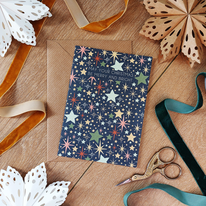 may your christmas be merry and bright navy starry night A6 christmas card paired with a brown envelope